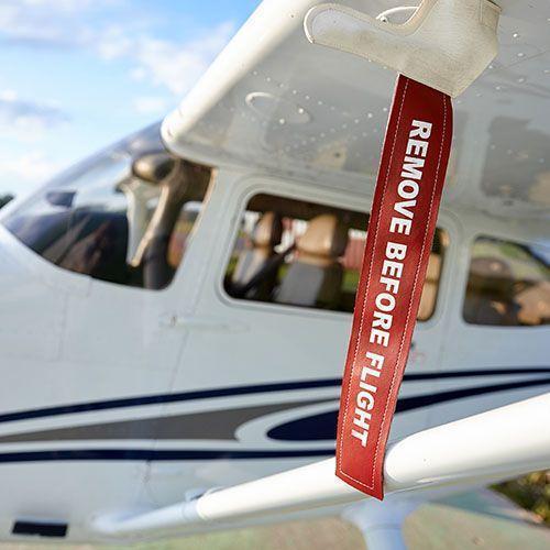 History behind the Remove Before Flight Phrase 